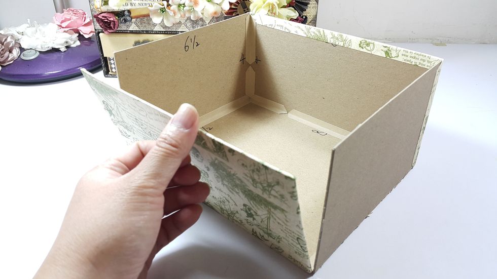 Cover the front and the back of the playhouse with pattern paper of 5"x9", don't adhere to the base for the front, otherwise you cannot open and close freely.