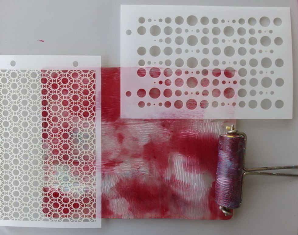 Cover the Gel plate with two Art Anthology Bubbles and Retro stencils as shown. Not much or close to zero will be seen after all on the finished project, but it adds a bit of texture.