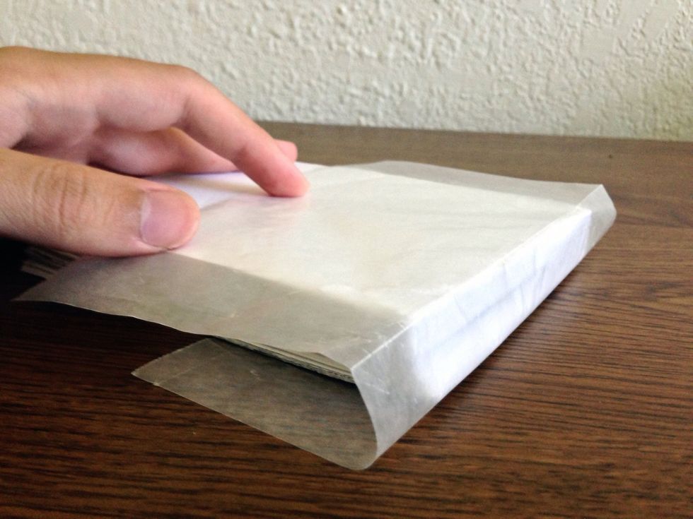 Cover the glued top with wax paper.