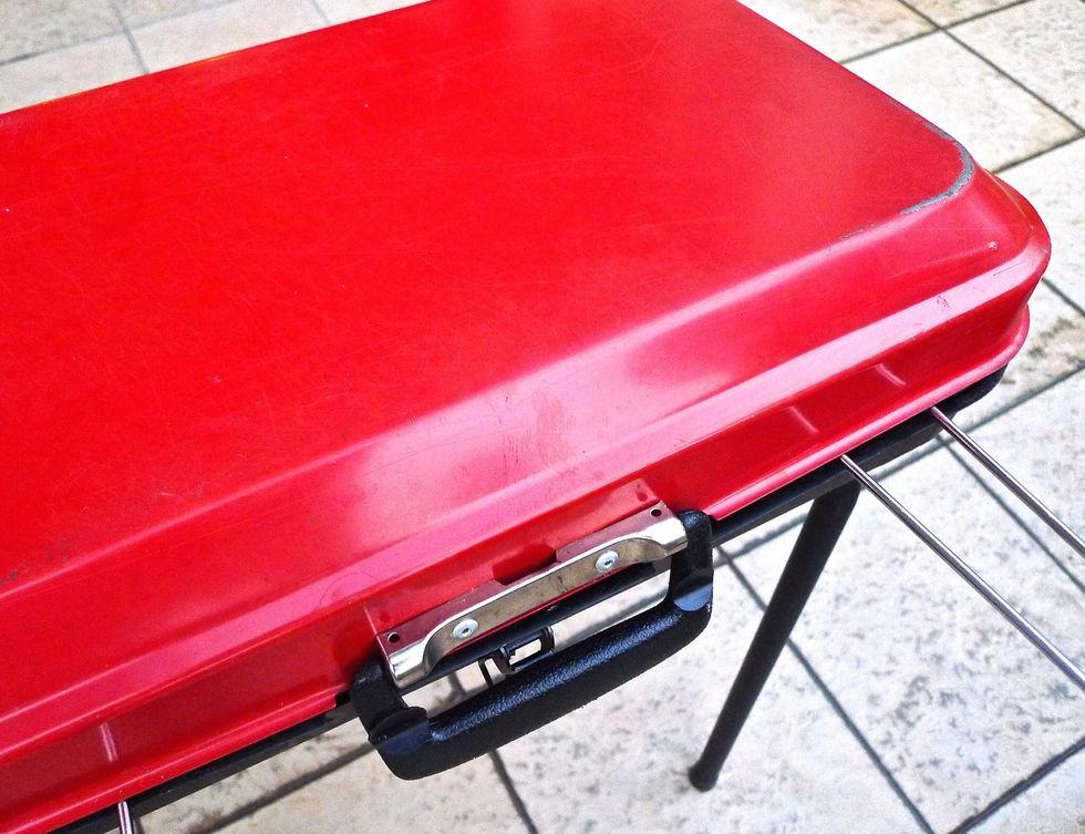 Cover the grill again after turning and brushing with the barbecue sauce.