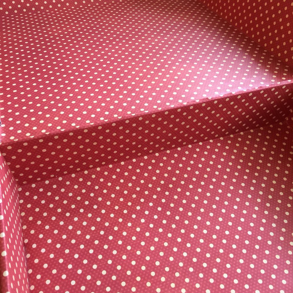 Cover the inside with DIY Craft Paper using double sided tape. Make patterns of special parts, for example box tabs.