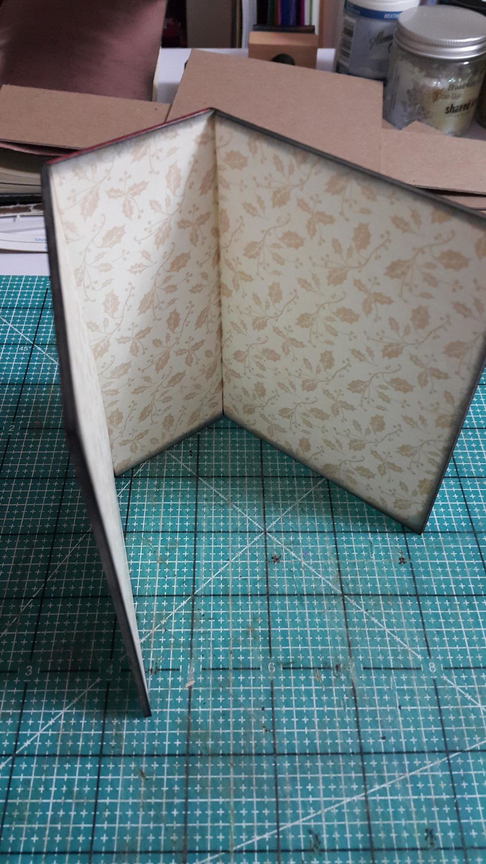 Cover the inside with paper as well and fold like an album cover