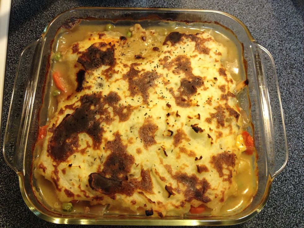 Cover the mix with cheese followed by the mash. Bake at 350 for 30 mins. If the potatoes aren't browned, turn on the broiler (I forgot to take a pre-baking pic; got busy talking with hubby..)