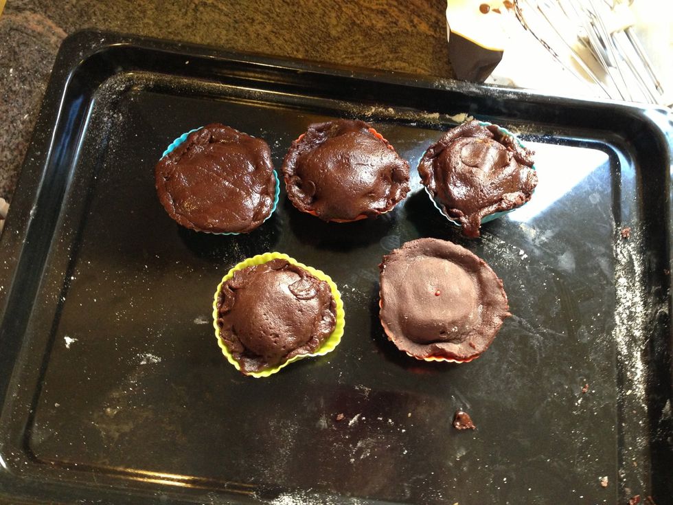 Cover the Oreo with the dough