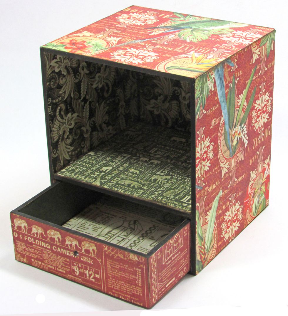 Cover the outside of the drawer and the case with paper. Sponge edges with brown ink.