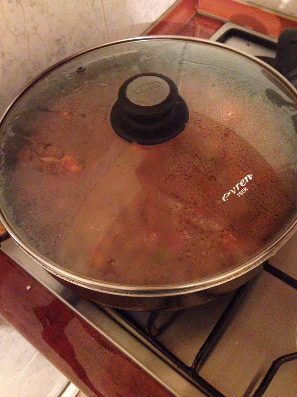 Cover the pan and let it cooke for at least 30 minutes, you can open and mix it and if it is dry add some boiling water.