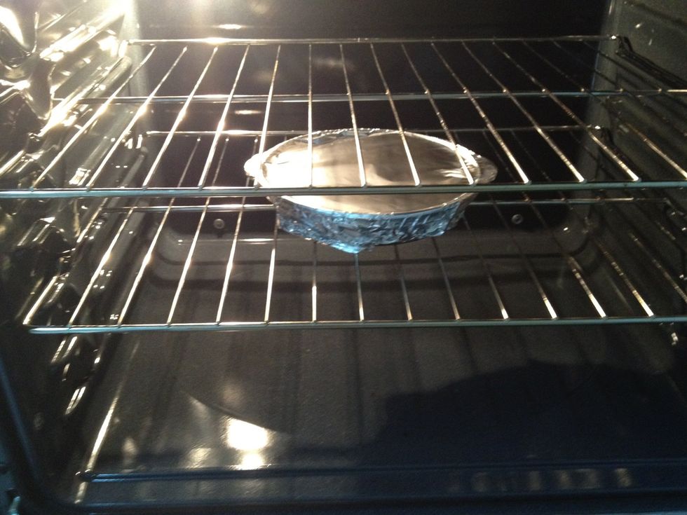 Cover the pan with foil. Put it in a 350f oven for 30-35 minutes.