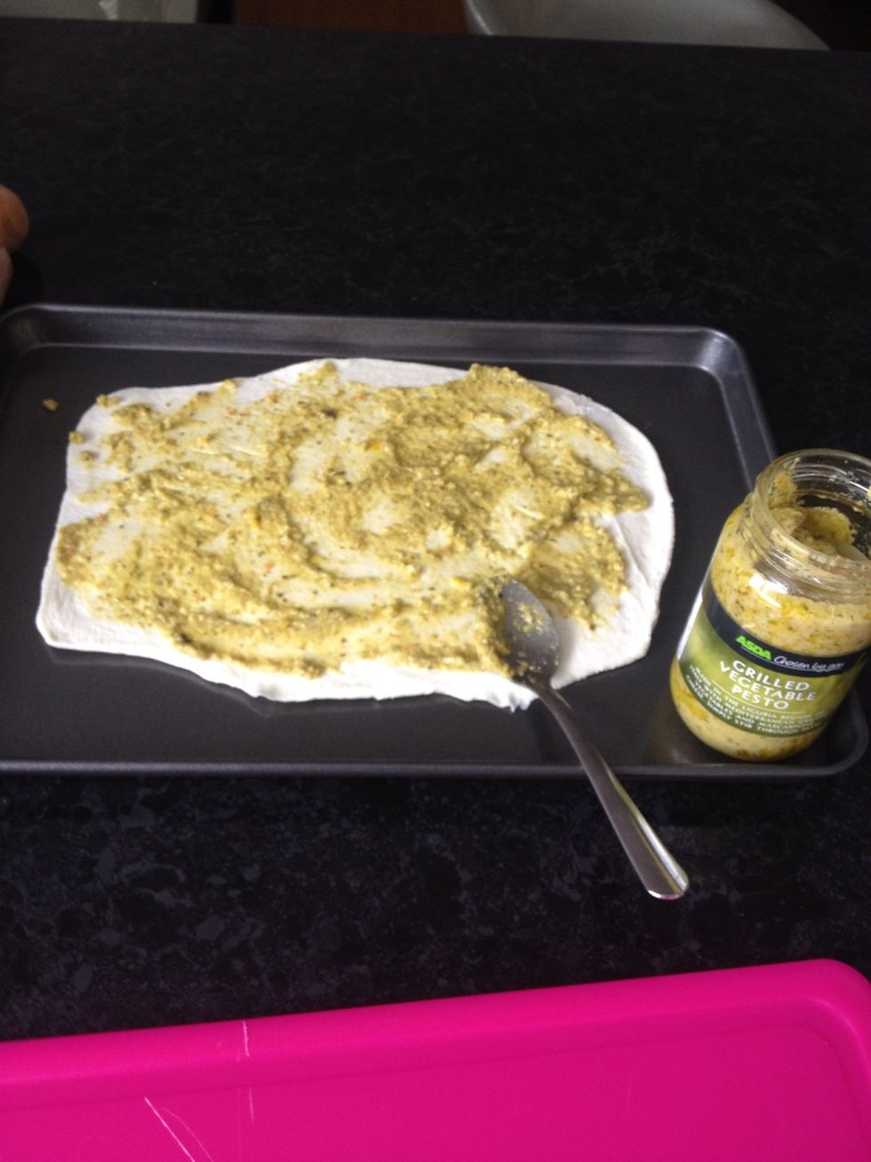 Cover the pastry with your desired pesto, I have used a grilled veg type which has ricotta in