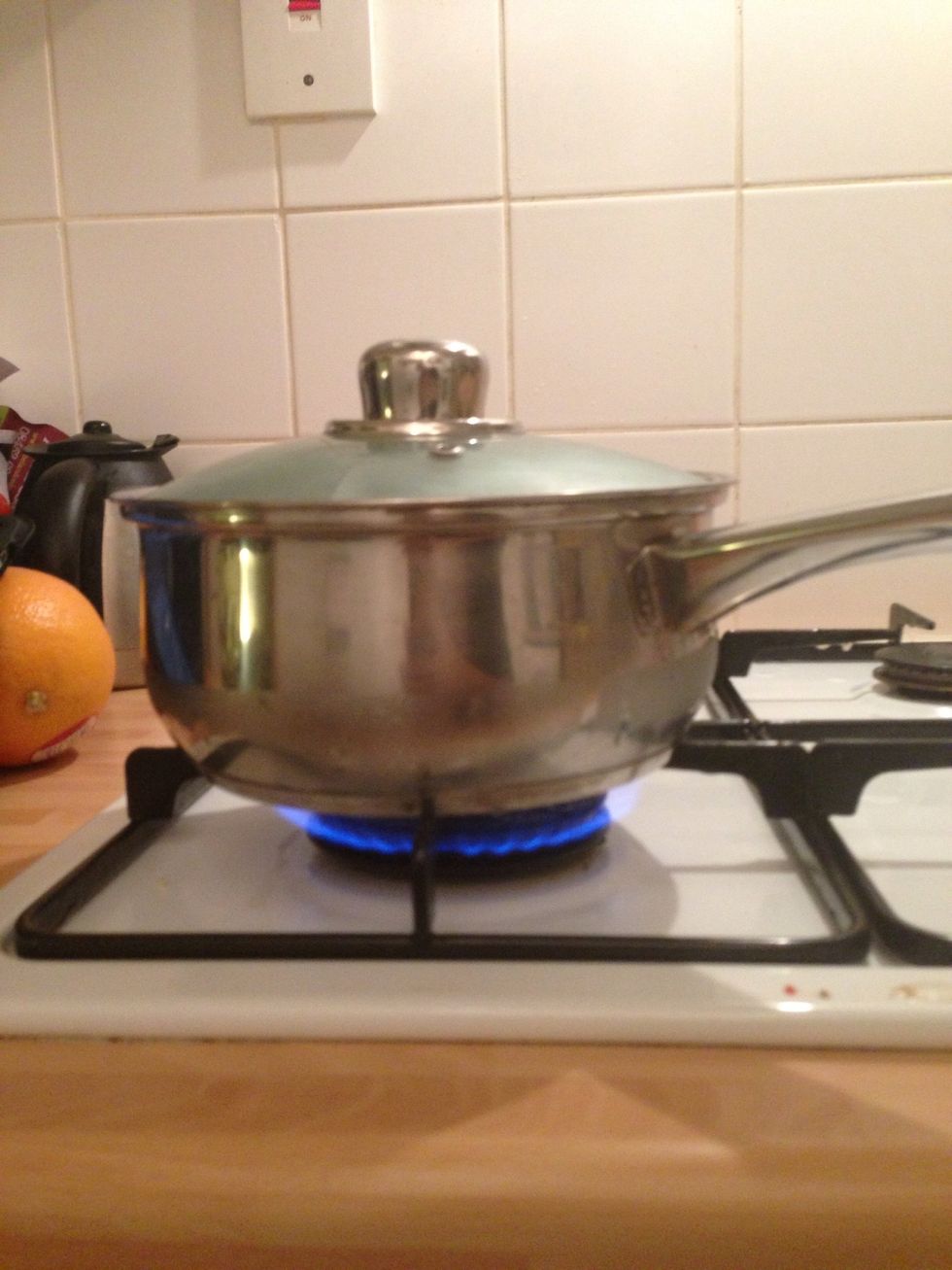 Cover the pot with lid and place on a high fire. Leave until it starts boiling.