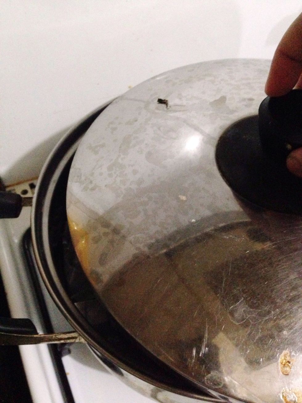 Cover the pot with lid. You have to keep the water temperature just below boiling point. If your water starts to boil, open the lid and add little bit water