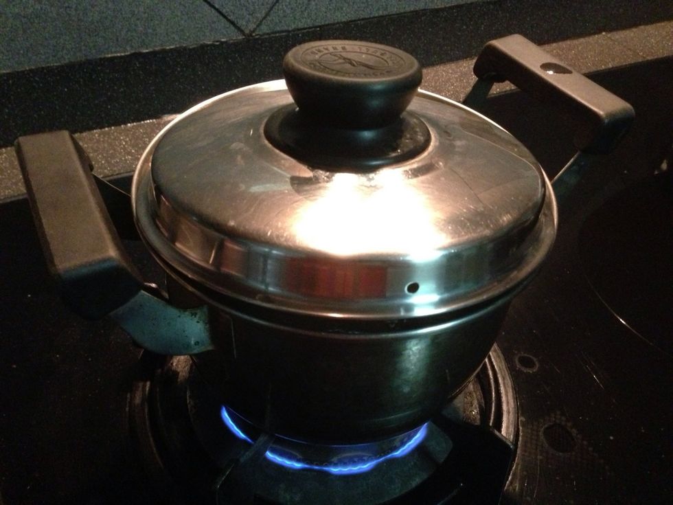 Cover the pot with the cover a little ajar to prevent the boiling water from spilling out. Boil for around 10-15 mins & turn off the fire.