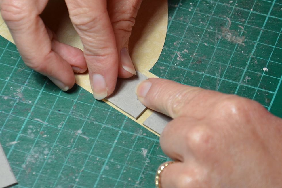 Cover the side pieces. This colour will be for inside your balloon basket.