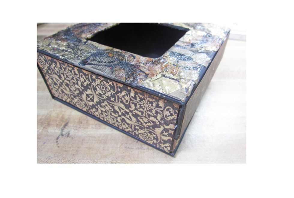 Cover the sides of the box with designer paper.