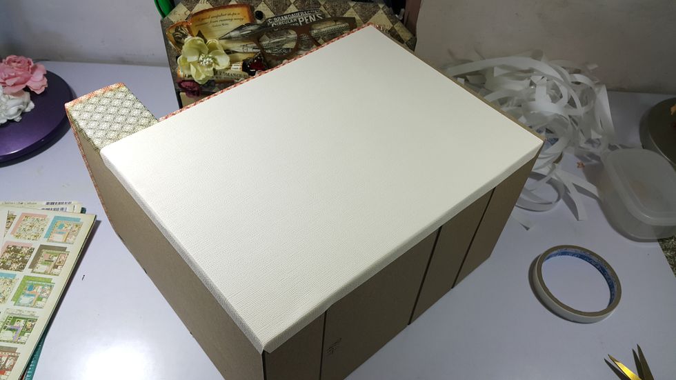 Cover the sides of the building with cardstock of 12"x9" as shown.