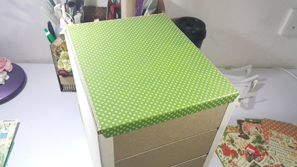 Cover the top of the building with pattern paper of 7"x9" as shown.