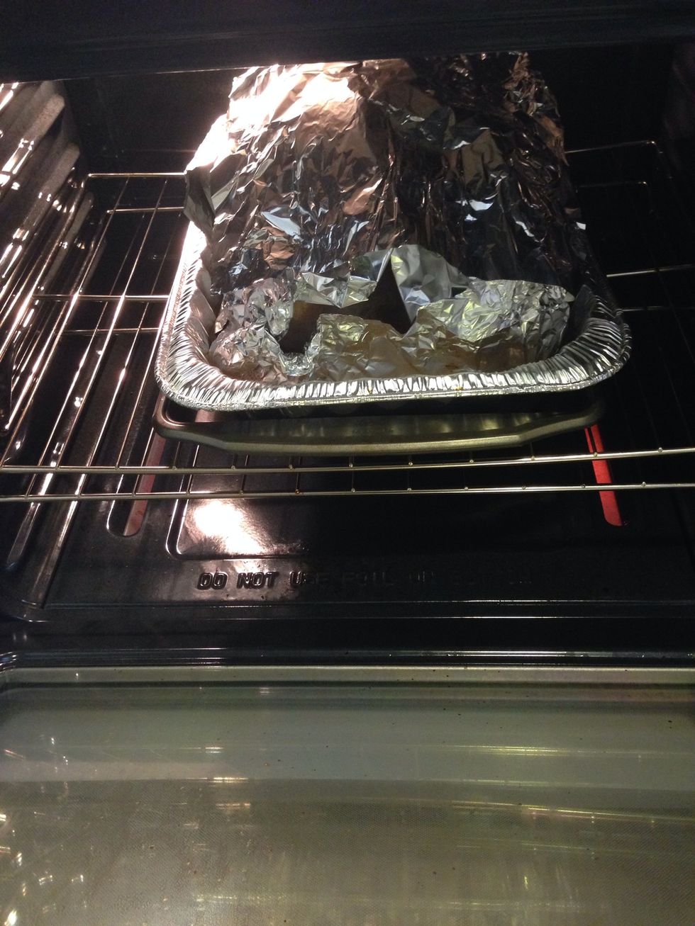 Cover the turkey with tin foil and follow cooking instructions. For my 17 lbs and unstuffed turkey, it says to cook 4-4 1/4 hrs. When an hour left, remove the tin foil so the turkey is golden brown.