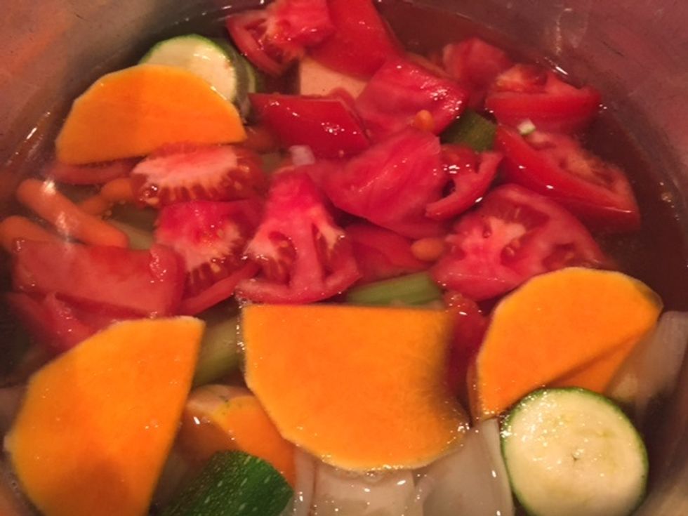 Cover the vegetables with water. Add spices. Bring to boil. lower the heat and simmer until vegetables are soft.
