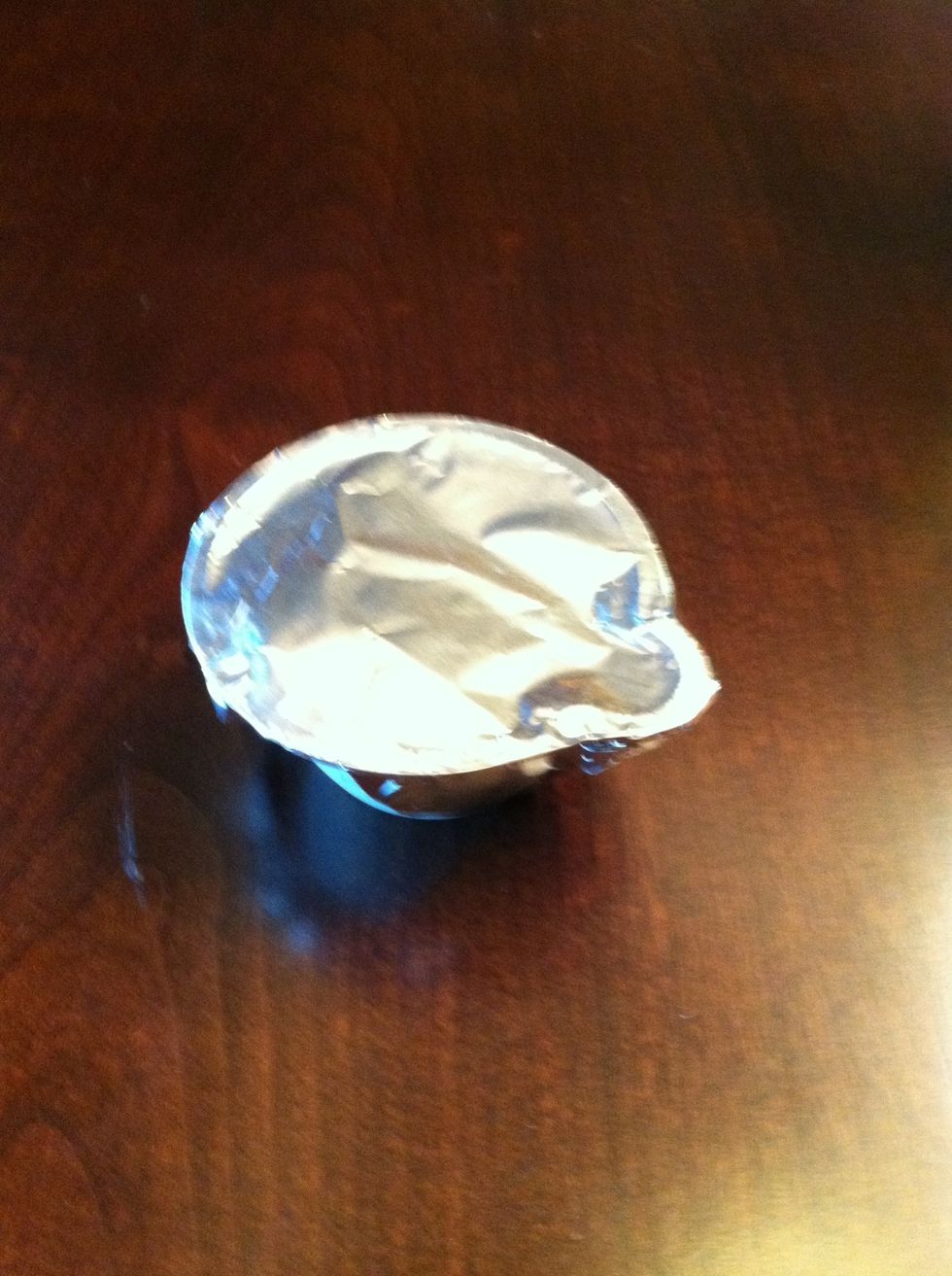 Cover the Vue cup with the small square of tinfoil.