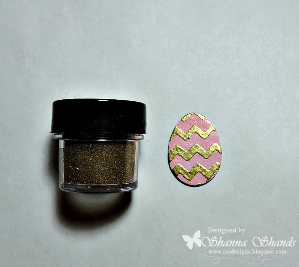 Cover the wet ink with embossing powder and heat set.