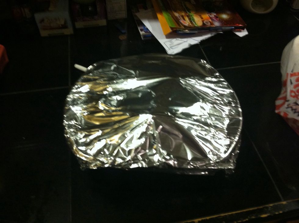 Cover them in some foil and out them in the oven on 500 for 30 minutes