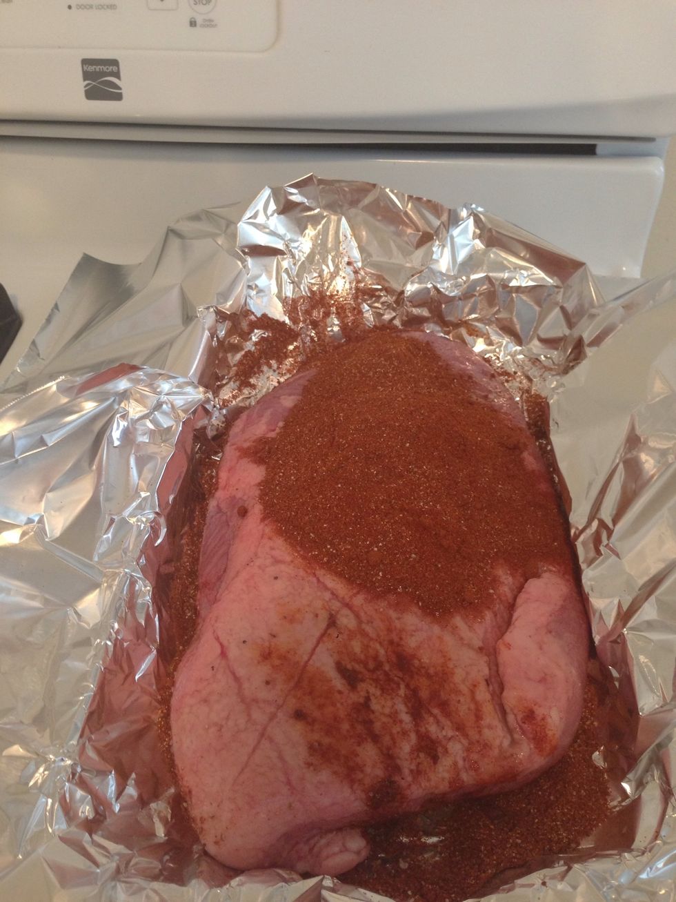 Cover this side of the brisket with lemon juice and add the dry rub.