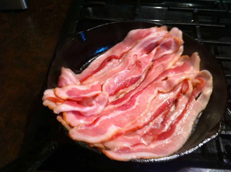Cover those. Keep layering like that till all bacon is in the skillet.