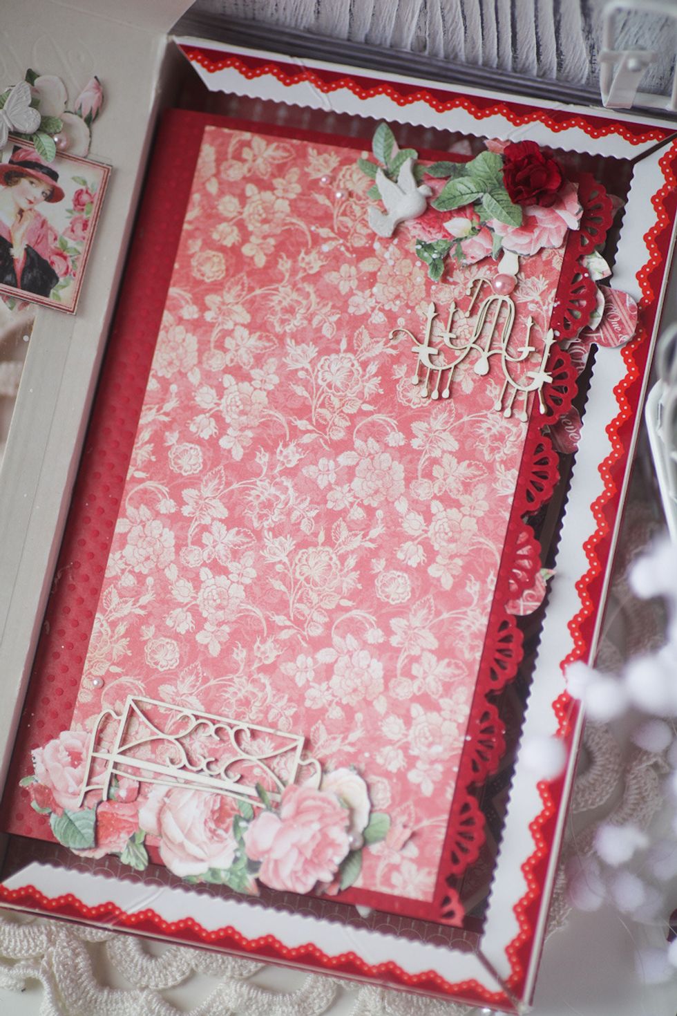 Cover top with paper and embelishments. Don't use big paper flowers inside the album just not to make pages too thick.