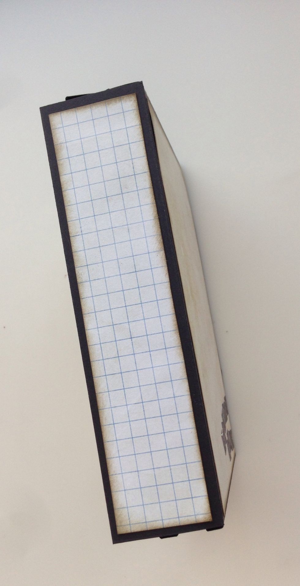 Cover vertical spines with patterned paper. ( i of the patterned paper rectangles will yield the spine papers.