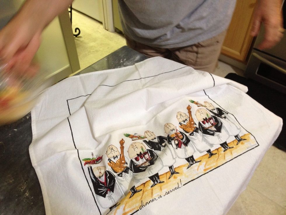 Cover with a clean cotton dish towel - NOT terry cloth! Set aside for about two hours until it doubles in size.