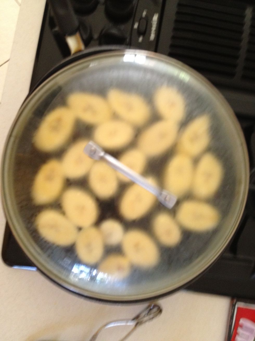 Cover with a lid to help cooking process.