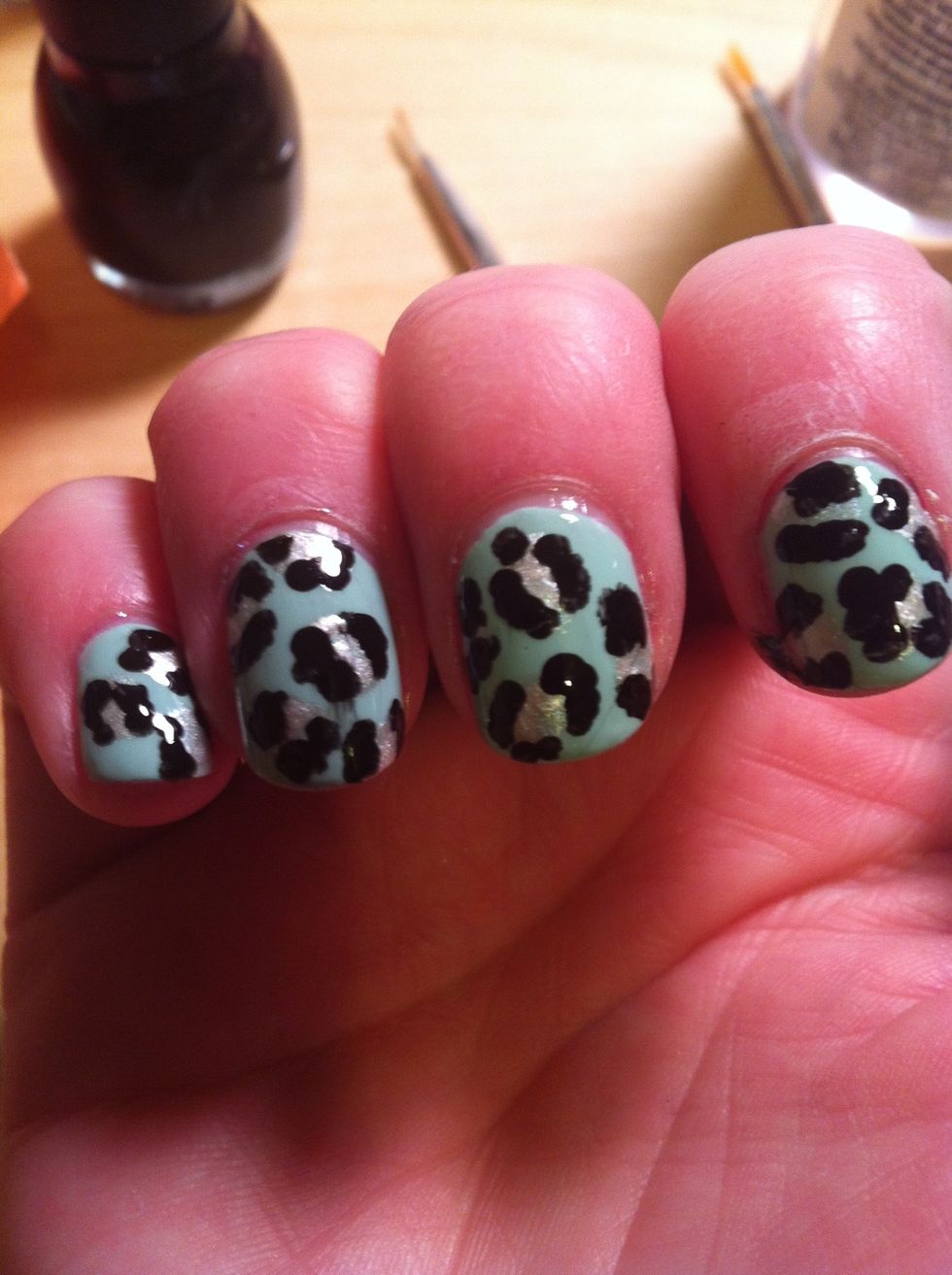 Cover with a quick dry top coat to smooth your design and add shine!