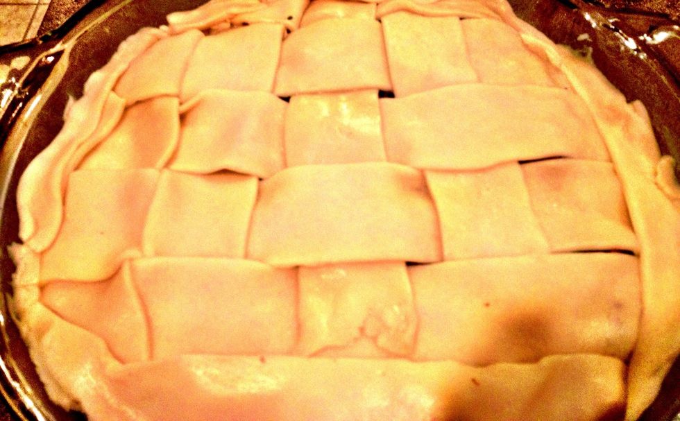 Cover with a refrigerator pie crust. No fancy designs necessary. I decided on a whim to see if I could figure out how to basket weave pie dough. Turns out ... Not really.