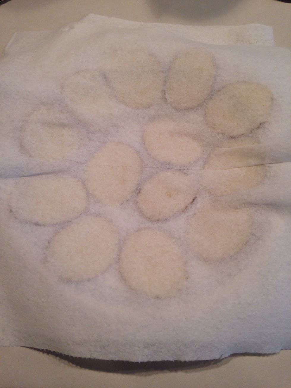 Cover with another paper towel and repeat Step 6 with another layer. Keep doing this until you have no more potatoes and the top layer is covered by a paper towel. (This helps to absorb excess water.)