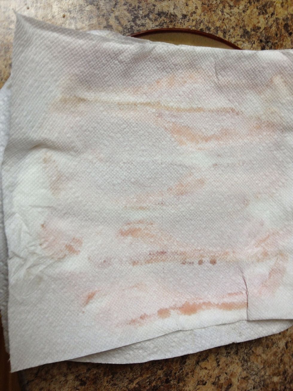 Cover with one paper towel. Do not pat it. It will make you bacon stick to the paper towel.