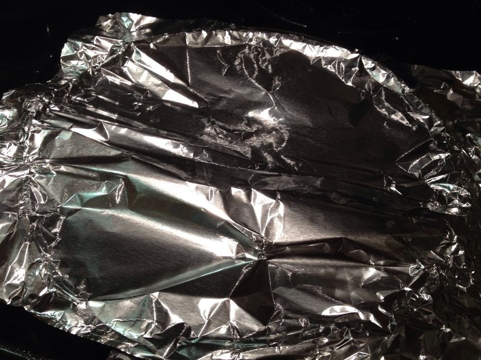 Cover with parchment paper if you have it. I was out so I used aluminum foil instead.