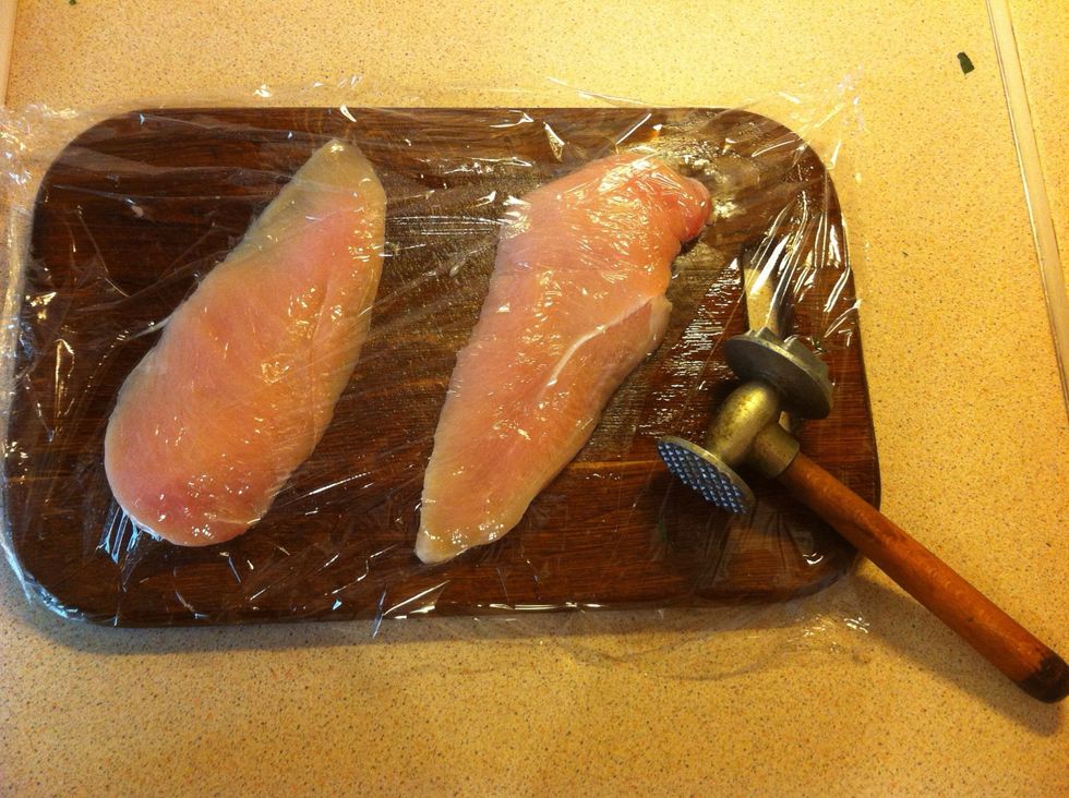 Cover with plastic wrap and beaten flat tenderizing hammer not too thin. Breast should of the same thickness.