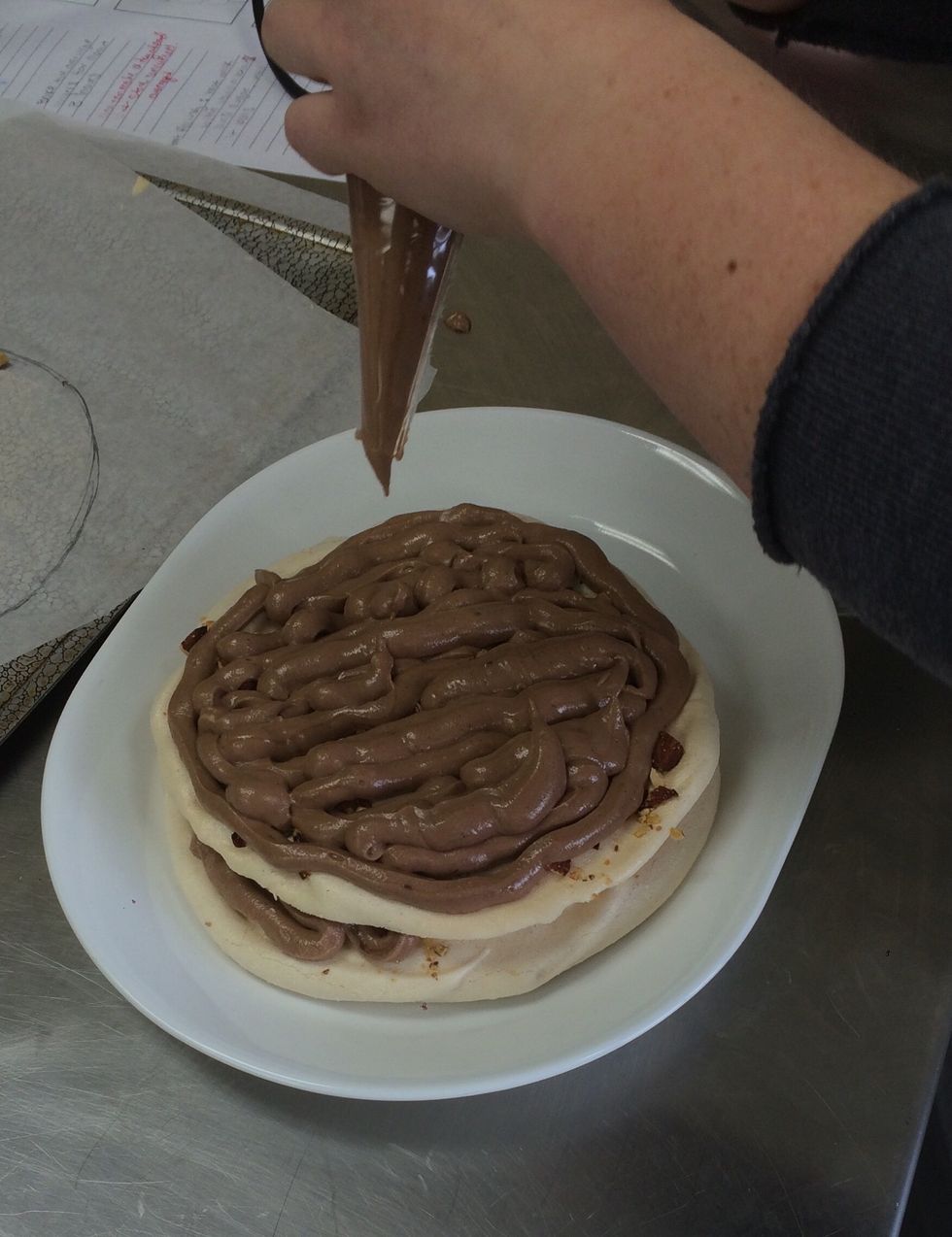 Cover with second meringue layer and pipe out filling over it as well.