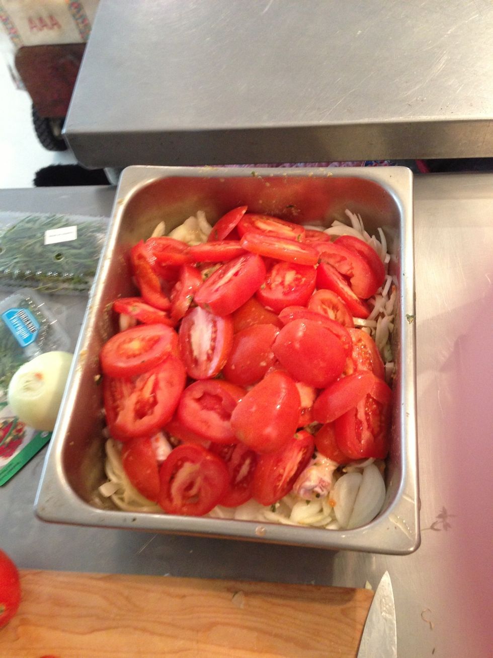 Cover with thick sliced tomatoes and bake at 400F for about 1.5 hrs. Baste every 30 min. Might want to slide tomatoes to side midway during cooking to brown chicken