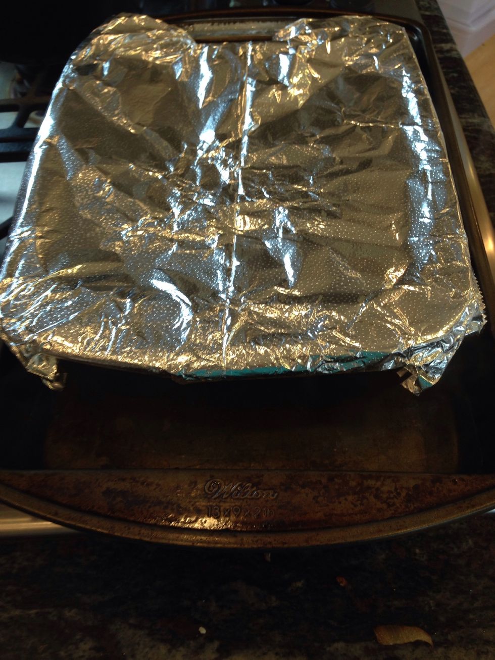 Cover with tin foil and put in the oven for 1 1/2 hours. Then remove foil and bake for another 30 minutes.