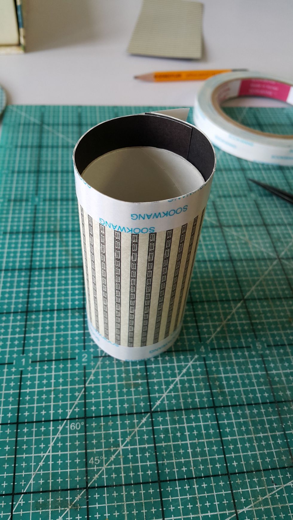 Cover with your favourite Graphic 45 papers, left 1/2" on both sides