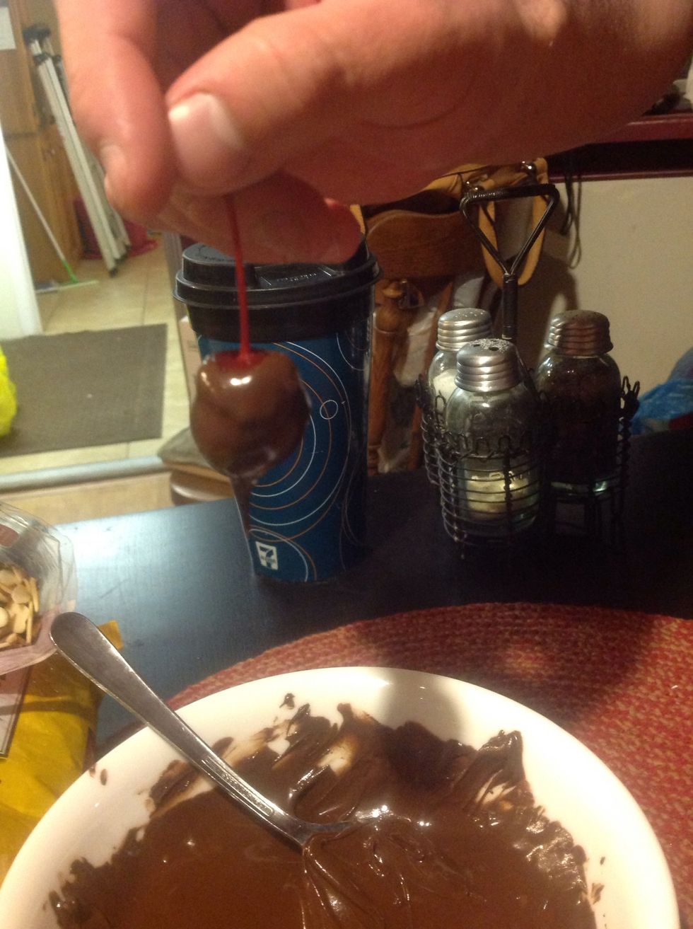 Cover your cherries as best you can in the melted chocolate