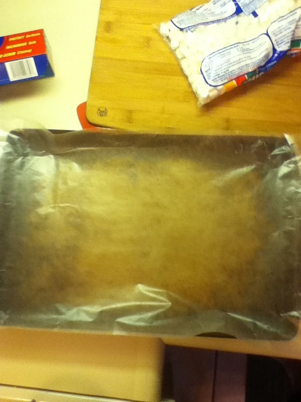 Cover your cookie sheet with some wax paper to prevent the Crispies from sticking