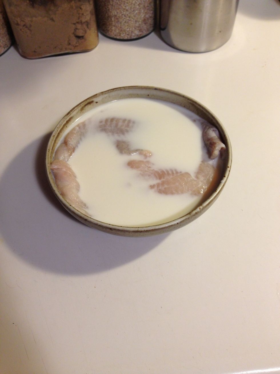 Cover your fish in a bowl of milk or buttermilk for about 30-45 seconds.