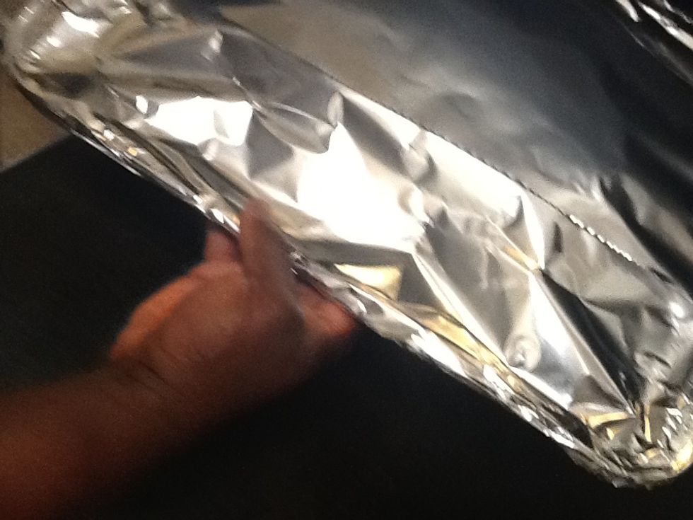 Cover your meatloaf and cook it for 45 minutes covered. Then uncover it  and cook for 10 minutes. Once done let it stand for 5 minutes and prepare to eat.