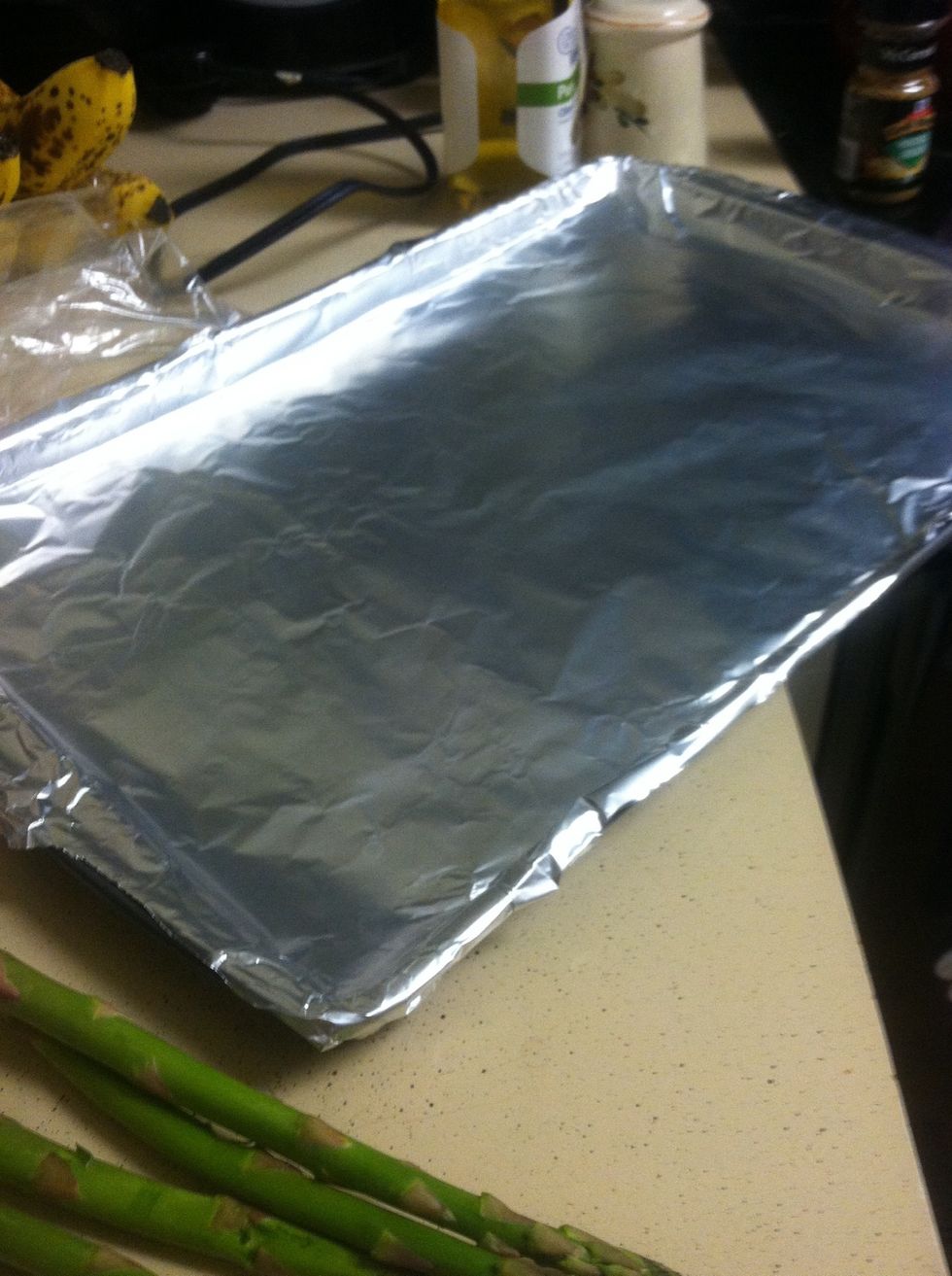 Cover your sheet pan with the aluminum foil.