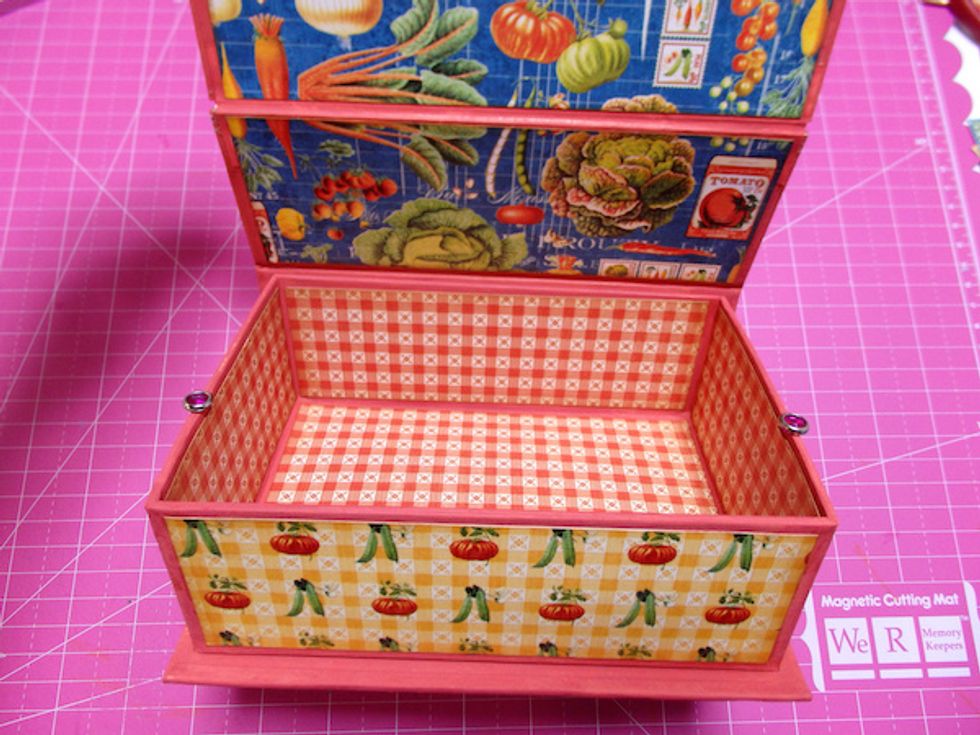 Covered inside with paper like this And add 2 Brads to edge of the box just like this , so when you hold the lid you can make a easel