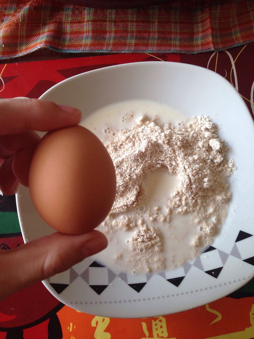 Crack 1 egg