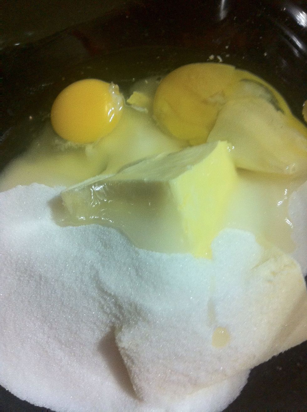 Crack 2 eggs.. Don't let any shells go in your cookie dough...