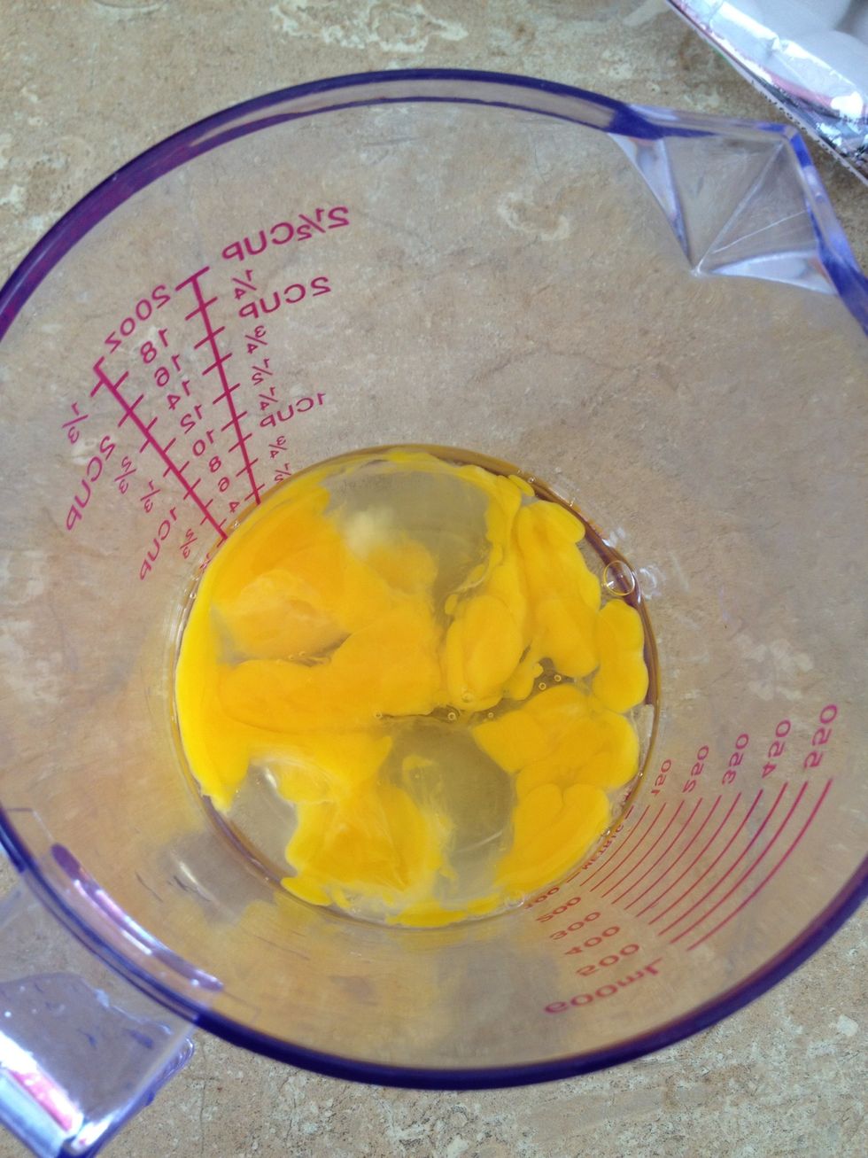 Crack 2 eggs, more if you like it thicker, and slightly whisk it to the point the yolk is running but not entirely mixed with the egg whites.