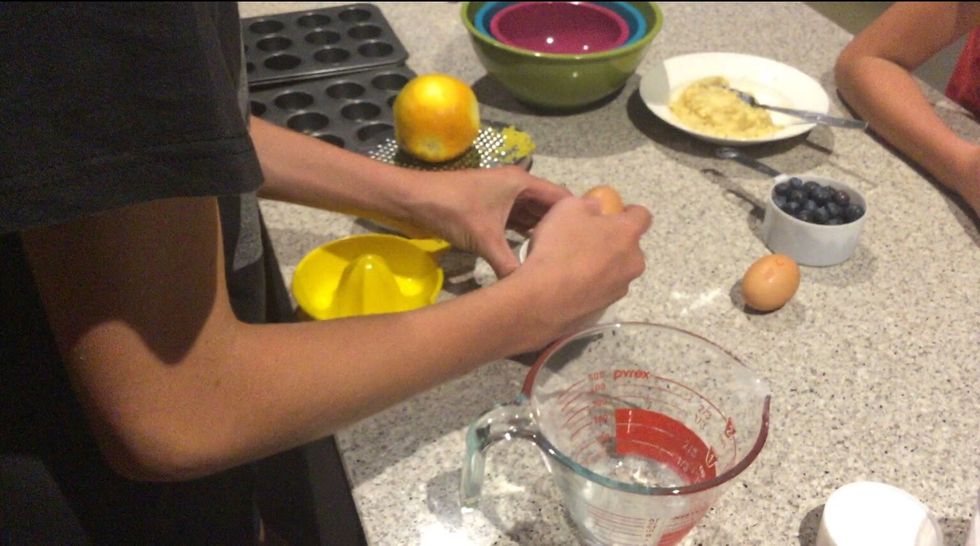 Crack 2 eggs then beat
